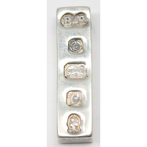 1150 - A vintage hallmarked silver ingot, Sheffield 1977, with pierced hole for chain mount, approx 21.37g ... 