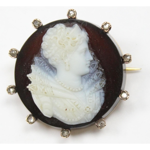 1164 - An 18ct gold and diamond set cameo brooch carved with and Elizabethan female bust, indistinctly mark... 