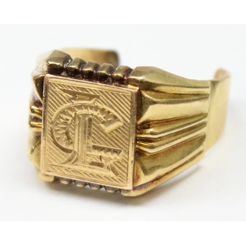 1166 - An unusual 18ct gold signet ring with cut out piece to back, indistinctly marked but XRF confirmed a... 