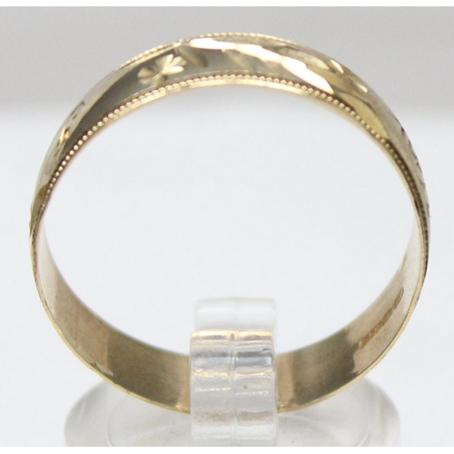 1174 - 9ct gold band ring with engraved decoration, marked and XRF confirmed, approx size Z, approx 2.45g g... 