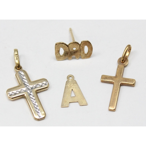 1179 - 2 9ct gold crucifix pendants, a 9ct gold A pendant or charm and a 9ct gold DAD pin, all XRF confirme... 