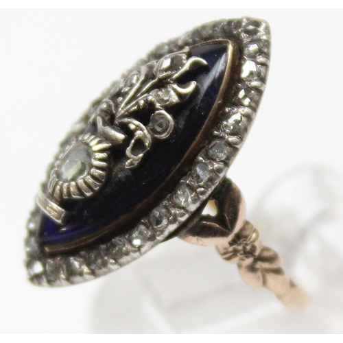 1189 - A Georgian diamond and blue enamel navette ring, a border of small diamonds surround the blue enamel... 