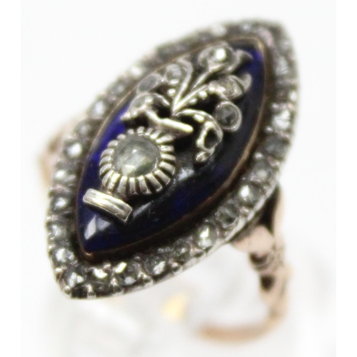 1189 - A Georgian diamond and blue enamel navette ring, a border of small diamonds surround the blue enamel... 