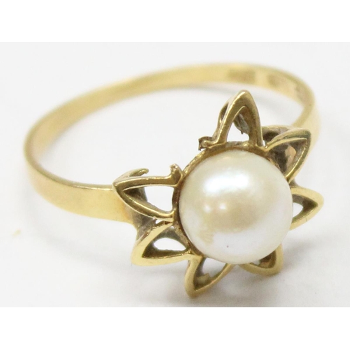 1191 - A yellow metal and pearl set cocktail ring, indistinctly marked but XRF testing as approx 18ct gold,... 