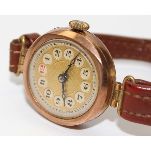 1310 - A vintage 9ct gold cased wristwatch with leather strap, marked for Chester 1928, approx 16.72g gross... 