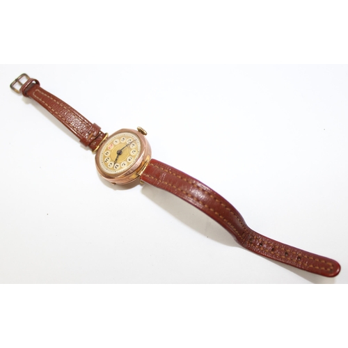 1310 - A vintage 9ct gold cased wristwatch with leather strap, marked for Chester 1928, approx 16.72g gross... 