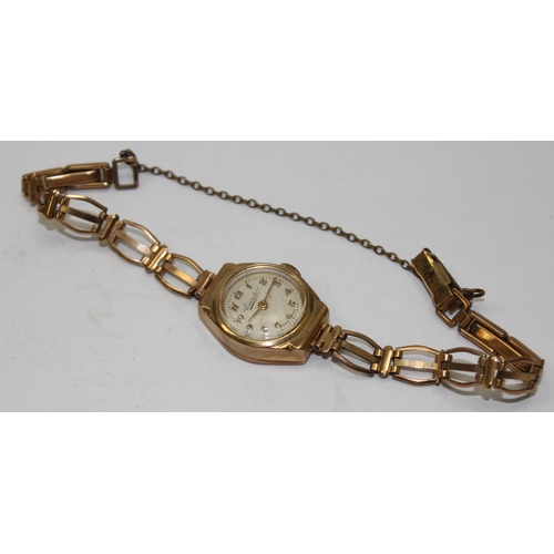 1311 - A vintage 9ct gold Everite watch with rolled gold strap, marked for London 1960, approx 11.97g gross... 