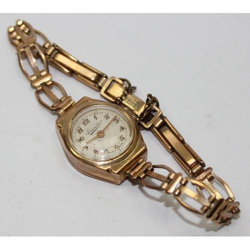 1311 - A vintage 9ct gold Everite watch with rolled gold strap, marked for London 1960, approx 11.97g gross... 