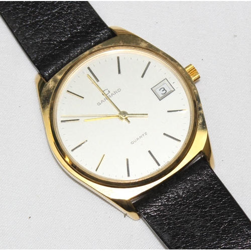 1314 - A vintage Garrards quartz watch in gold plated case with leather strap, displayed in original box, t... 