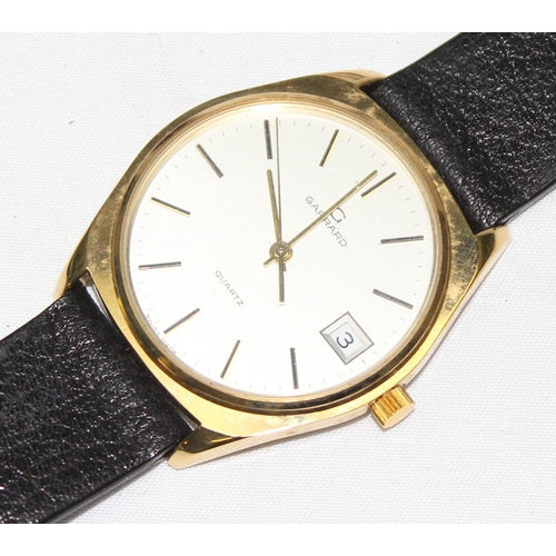 1314 - A vintage Garrards quartz watch in gold plated case with leather strap, displayed in original box, t... 