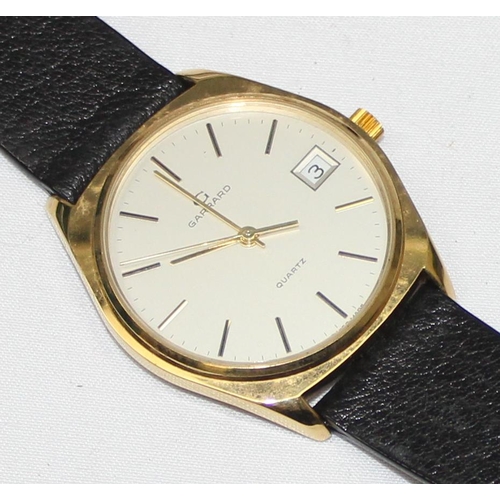 1314 - A vintage Garrards quartz watch in gold plated case with leather strap, displayed in original box, t... 