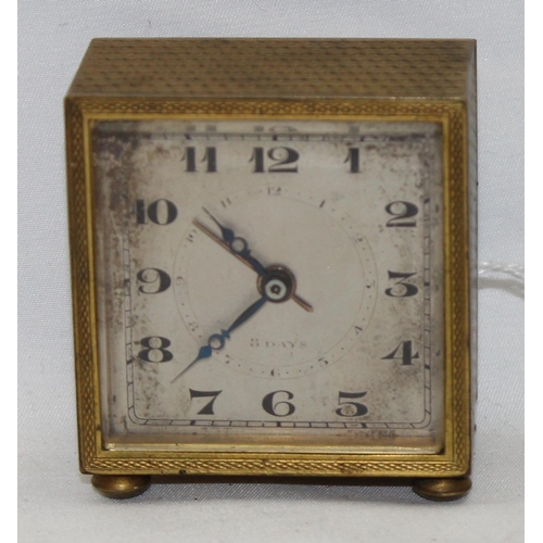 1320 - A small vintage Swiss made gilt metal cased alarm clock, approx 52mm wide, no maker