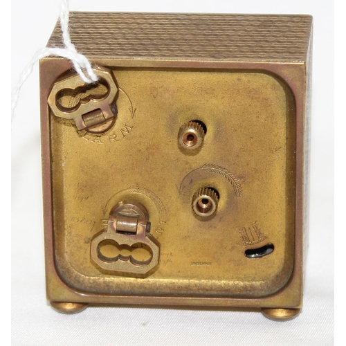 1320 - A small vintage Swiss made gilt metal cased alarm clock, approx 52mm wide, no maker