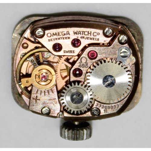 1321 - An Omega 485 cal mechanical watch movement with metallic blue face and baton numerals, approx 16mm x... 