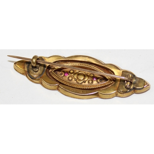 1120Q - An antique 9ct gold and pink stone set brooch, marked 9ct and XRF confirmed, approx 47mm wide, appro... 