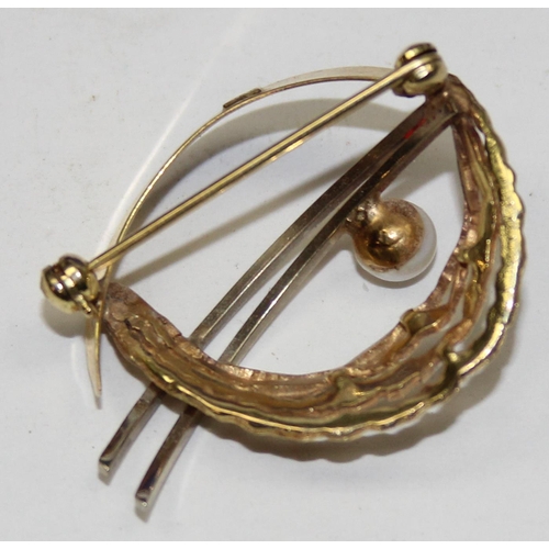 1120S - A retro 8ct (.333) yellow and white gold pearl set brooch, likely German in origin, marked 333 and X... 