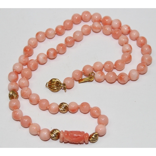 1120T - A 14ct gold and pink coral bead necklace, the clasp marked 14kt and XRF confirmed on clasp and balls... 