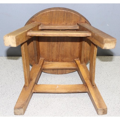 199 - A small wooden children's stool with textured ant design, approx 28cm wide x 28cm deep x 22cm tall