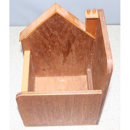 299D - Pair of wooden model house bookends with hidden drawers, approx height 23cm