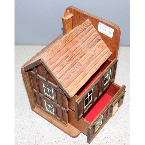 299D - Pair of wooden model house bookends with hidden drawers, approx height 23cm