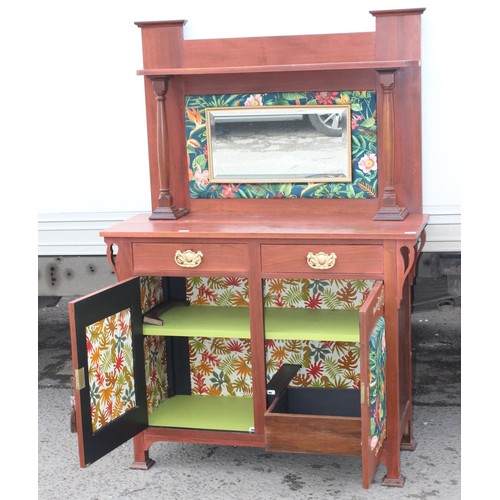 13 - An antique mahogany sideboard with later decorative fabric panels and gold painted strap hinges, app... 