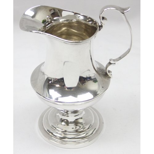 1041 - An antique Georgian style silver cream jug, Birmingham 1924 by Docker & Burn, approx 11cm tall, appr... 