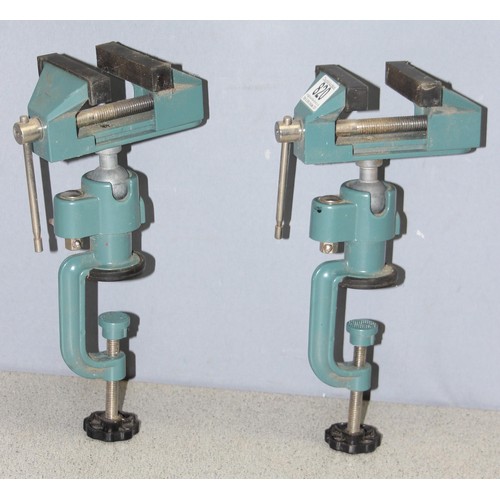 817 - 2 watchmakers self adjusting clamps