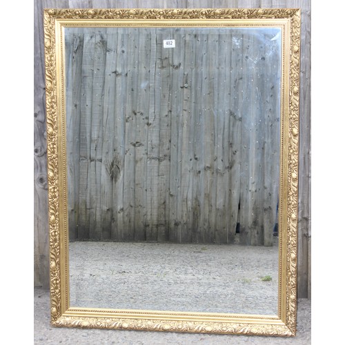 482 - A large decorative gilt framed mirror, approx 113cm x 88cm