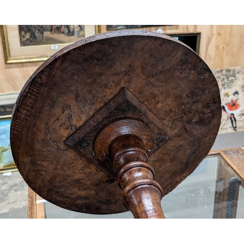 21 - An unusual antique side table with burrwood top, possibly Elm, on pedestal base, approx 41cm diamete... 