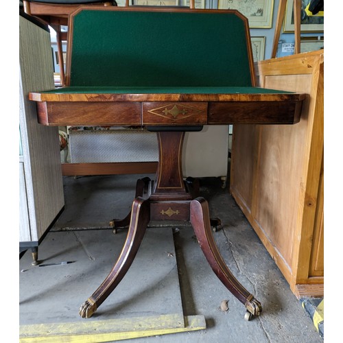 170 - An antique mahogany card table with fold over top, baize lined interior and  games, approx 90cm wide... 