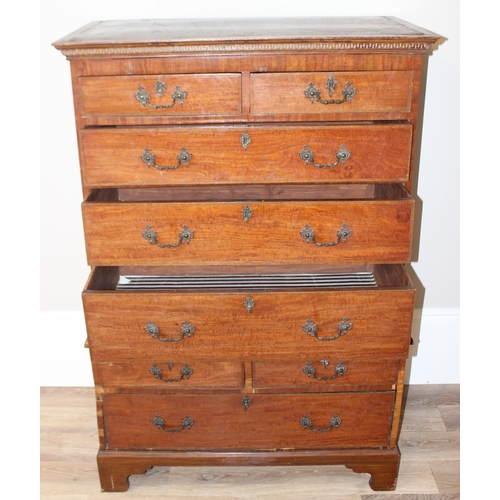 8 - A 19th century mahogany chest on chest with highly decorative brass drop handles, 2 over 3 to top, 2... 