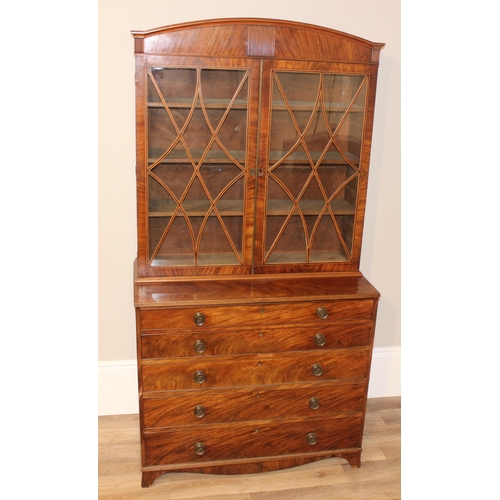 95 - A George III mahogany Secrétaire bookcase, with astragal glazed doors above 5 drawers, the top 2 fit... 