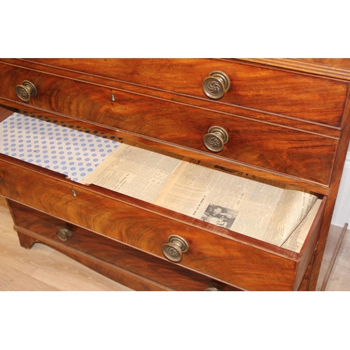 95 - A George III mahogany Secrétaire bookcase, with astragal glazed doors above 5 drawers, the top 2 fit... 