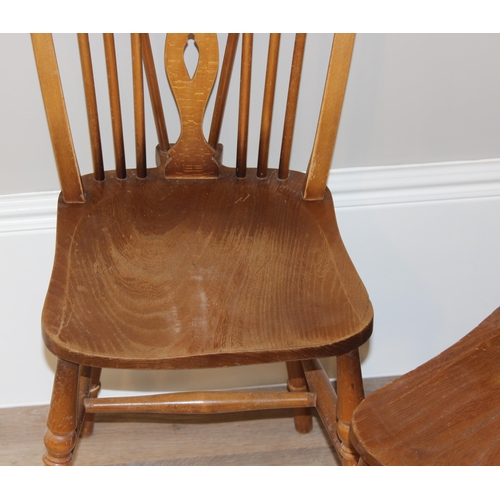 48 - A set of 6 vintage wheelback kitchen chairs with elm seats