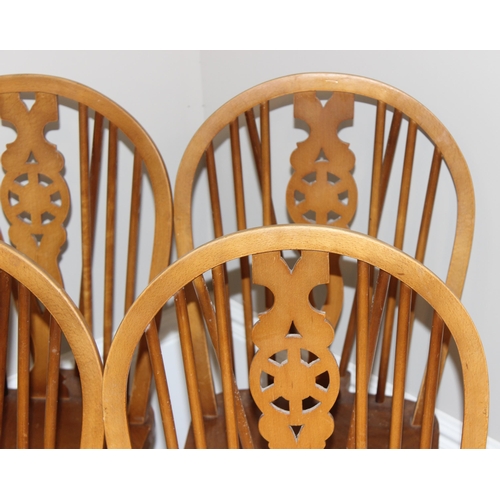 48 - A set of 6 vintage wheelback kitchen chairs with elm seats