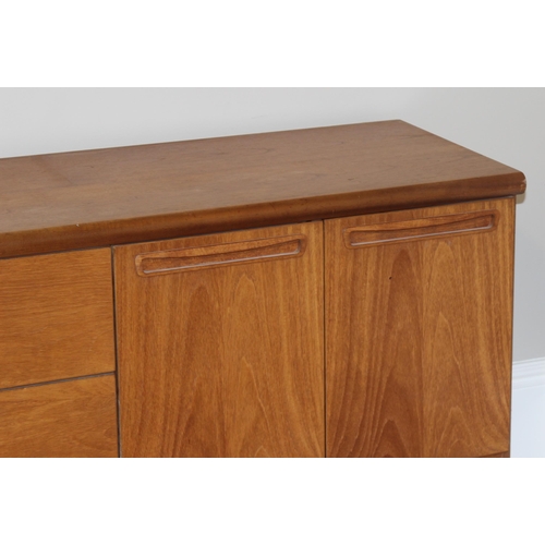 36 - A retro wooden sideboard on hairpin legs, seemingly unmarked but possibly Meredew, 2 drawers to cent... 