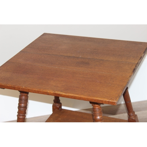 79 - An early 20th century oak occasional table with turned legs, approx 61cm wide x 61cm deep x 66cm tal... 