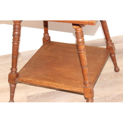 79 - An early 20th century oak occasional table with turned legs, approx 61cm wide x 61cm deep x 66cm tal... 