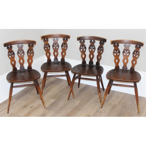 46 - A set of 4 Ercol fleur-de-lys chairs, each approx 79cm tall