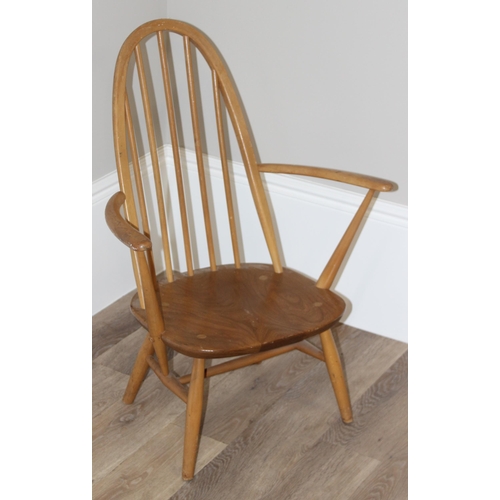 70 - A retro Ercol hooped back open armchair with original blue & gold label, approx 79cm tall