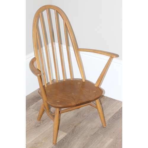 70 - A retro Ercol hooped back open armchair with original blue & gold label, approx 79cm tall