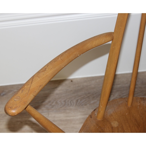 70 - A retro Ercol hooped back open armchair with original blue & gold label, approx 79cm tall