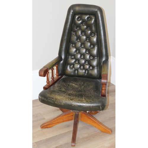 65 - A vintage green leather Chesterfield button backed desk chair with wooden base, approx 61cm wide x 6... 