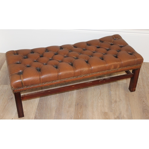 62 - A vintage Chesterfield style button back slipper chair and a similar matching long low footstool, st... 