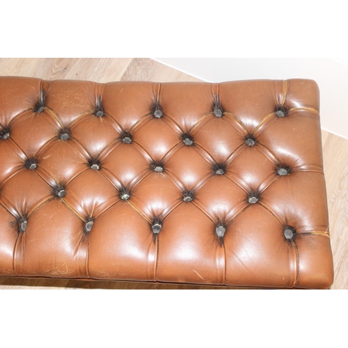 62 - A vintage Chesterfield style button back slipper chair and a similar matching long low footstool, st... 