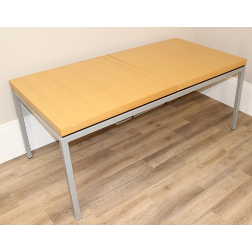 31 - A modern Scandinavian extendable dining table by BoConcept, seemingly unmarked, approx 184cm wide x ... 