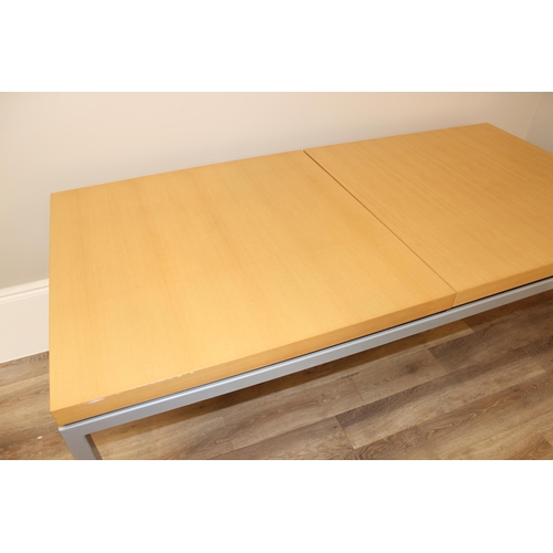 31 - A modern Scandinavian extendable dining table by BoConcept, seemingly unmarked, approx 184cm wide x ... 