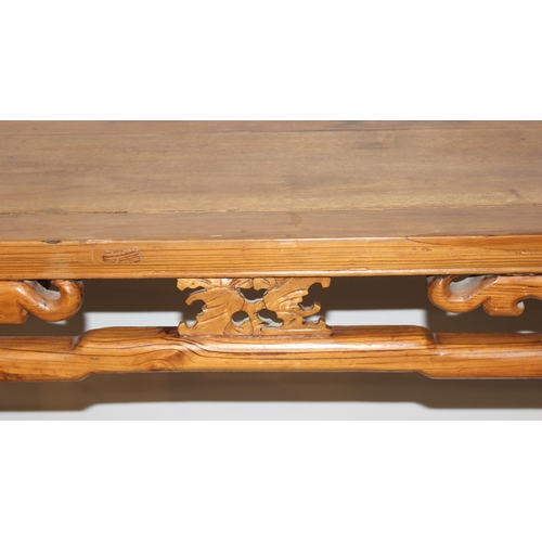 21 - An antique Chinese altar table with carved wooden frieze, likely 19th century, believed to be peach ... 