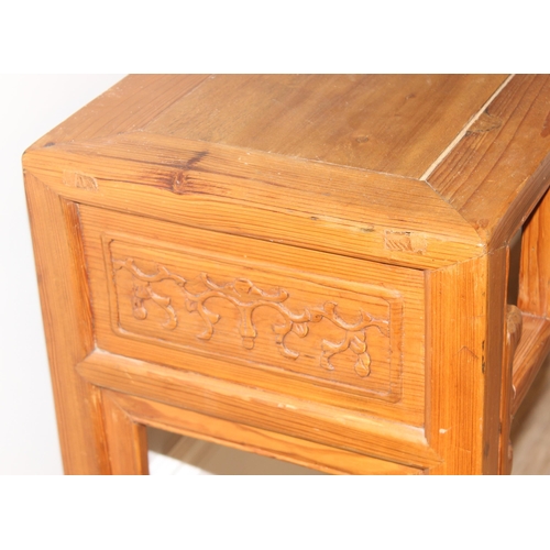 21 - An antique Chinese altar table with carved wooden frieze, likely 19th century, believed to be peach ... 