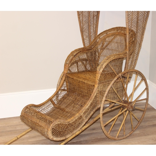 98 - A full size vintage wicker rickshaw, likely c.1950's, approx 220cm wide x 98cm deep x 92cm tall